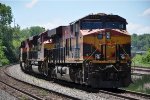 Paused northbound grain train holds the main